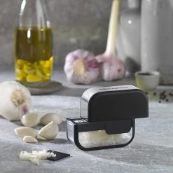 Microplane Stainless Steel Garlic Cutter -KITCHEN GADGETS Store 48914 Microplane Garlic Cutter 600px 4